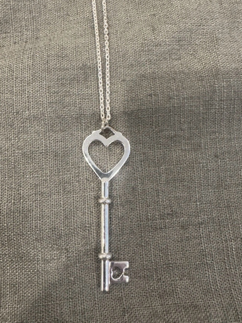 Sterling silver heart key necklace.
